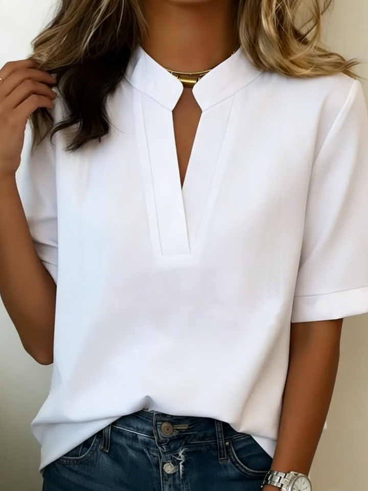 Soraya | Chic bluse med V-udskæring og gylden detalje
