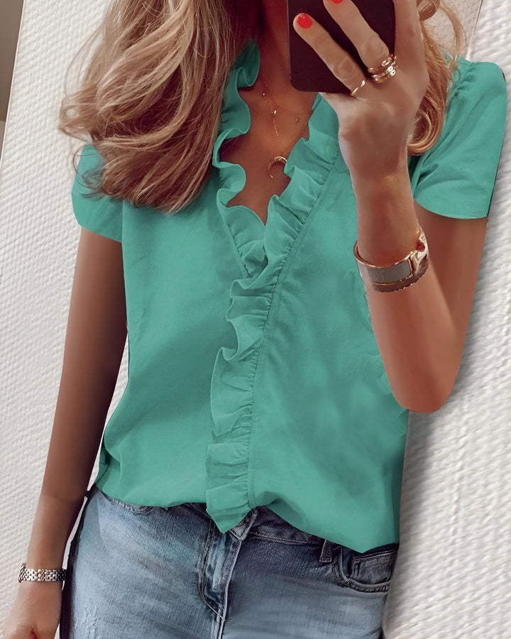 Asta™ – Luftig og elegant bluse med flæser